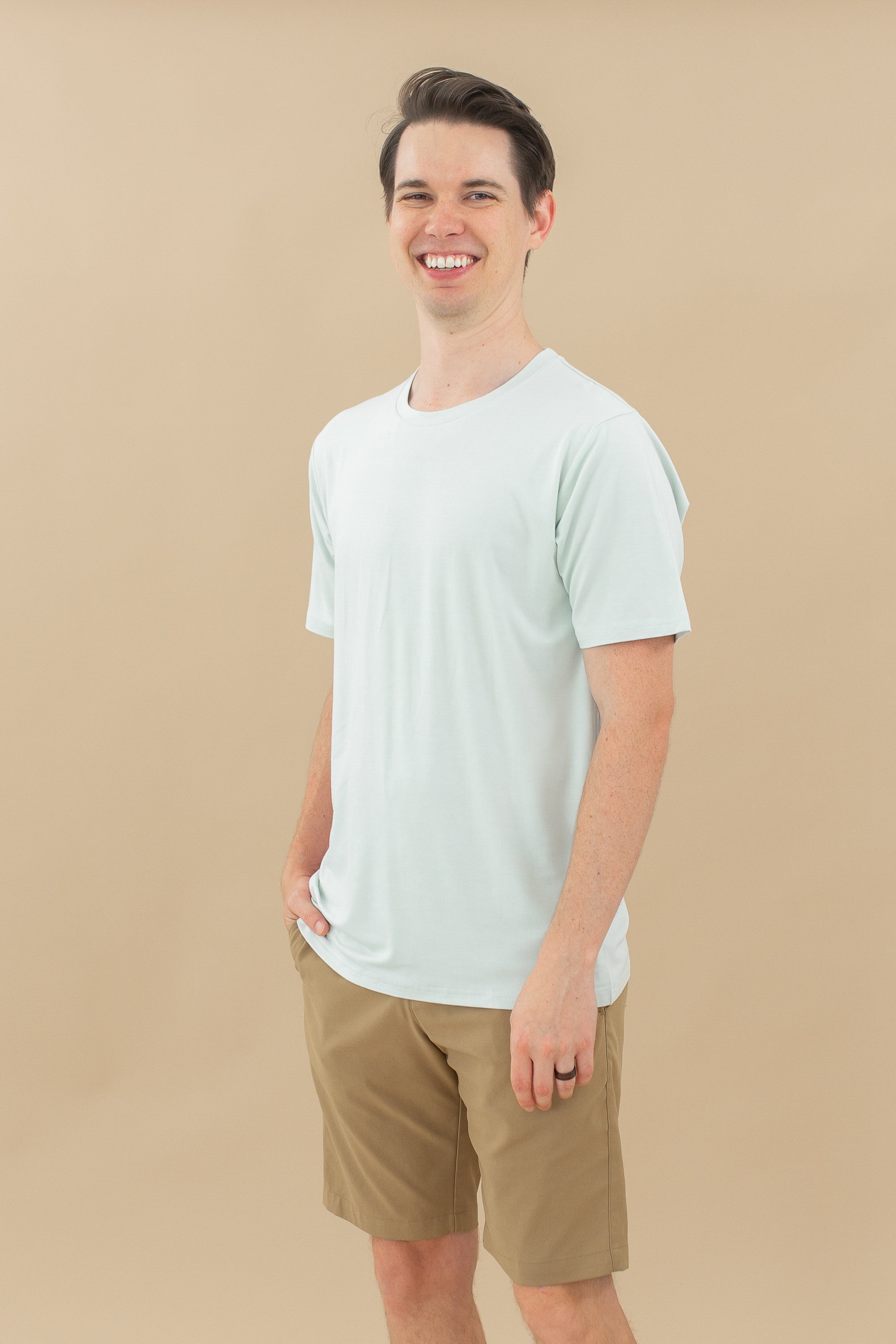 Man modeling Men's Crew Neck Tee in Dew