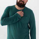 Male model wearing the Men's Jogger Set in Emerald with one hand on his chest