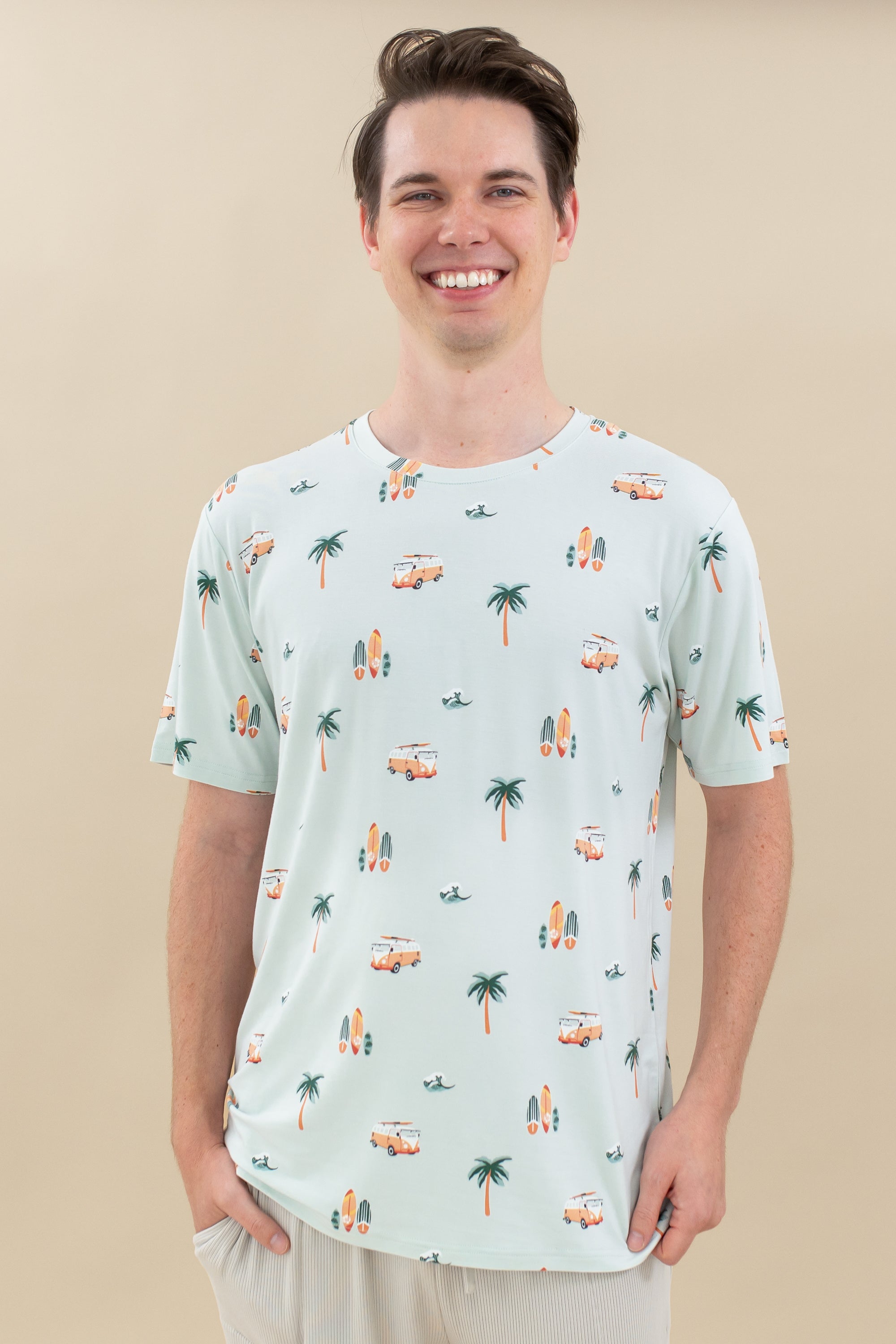 Man modeling Men's Crew Neck Tee in Dew Surf