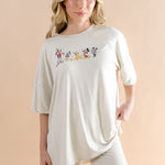 Woman modeling the Kyte Women’s Biker Short Set in Mickey and Friends on Ecru ::: Model is 5'7" wearing size S ///