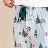 Modal showcasing green drawstring on Men's Lounge Pants in Mickey & Friends Christmas print over white T-shirt on a beige background