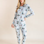 Woman wearing Women's Jogger Pajama Set in Mickey & Friends Christmas print on a beige background
::: Model is 5'10" wearing size S ///
