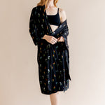 Model wearing Women’s Kimono Robe in Midnight Wildflower print and black bra on a beige background

::: Model is 5'8" wearing size XS/S ///
