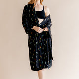 Model wearing Women’s Kimono Robe in Midnight Wildflower print and black bra on a beige background

::: Model is 5'8" wearing size XS/S ///
