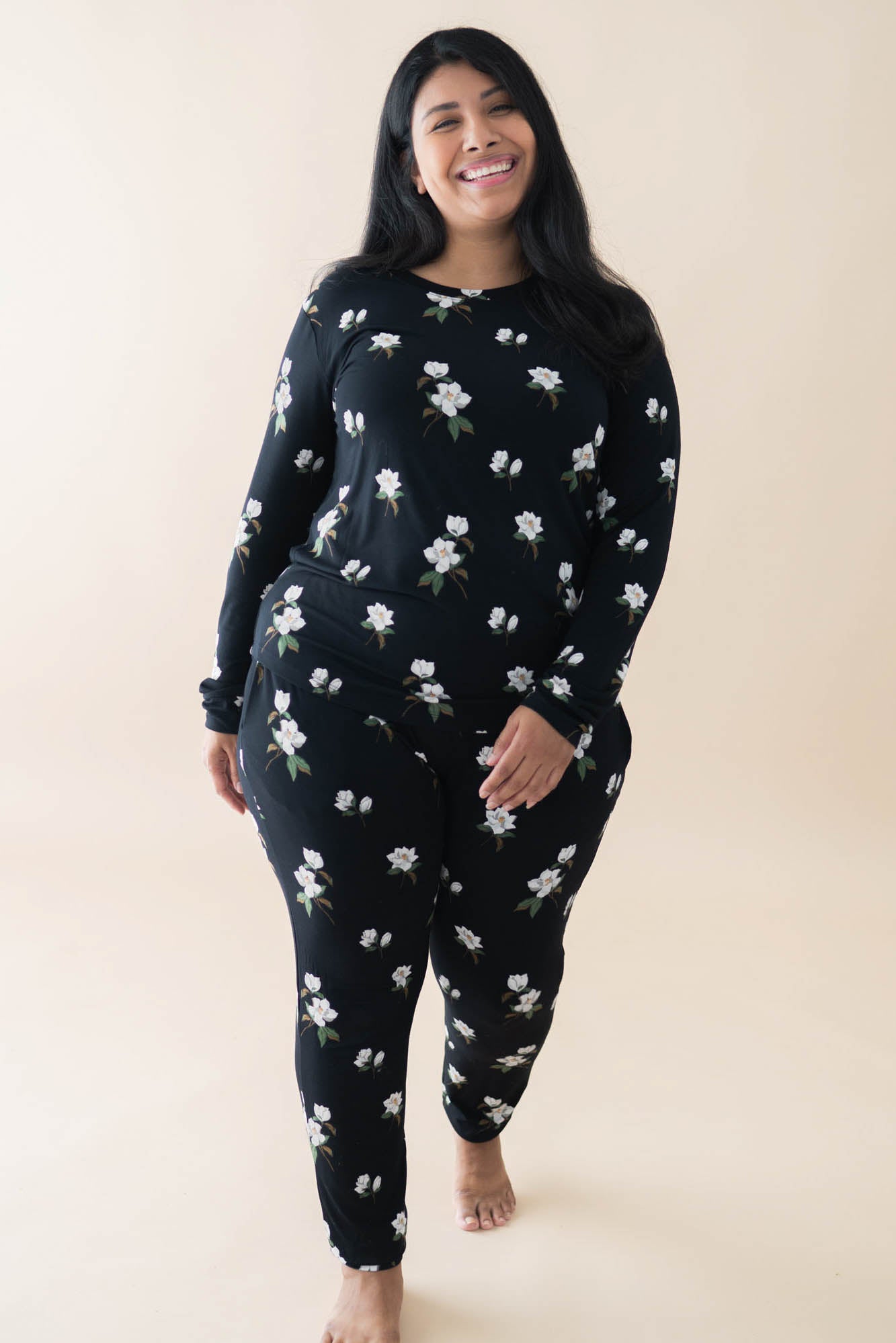 Smiling model wearing the Women's Jogger Pajama Set in Big Midnight Magnolia