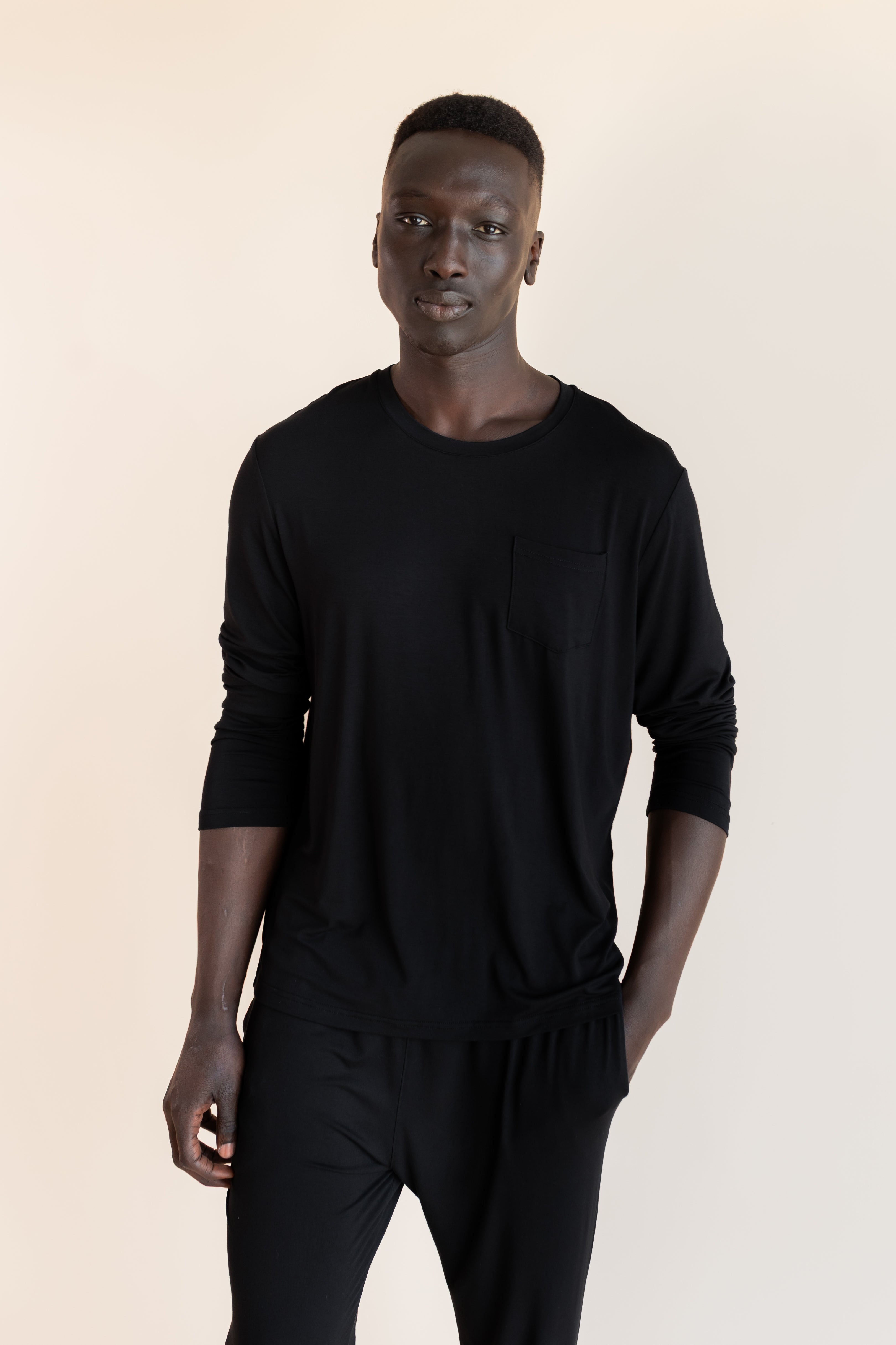 Male model wearing the Men's Jogger Set in Midnight