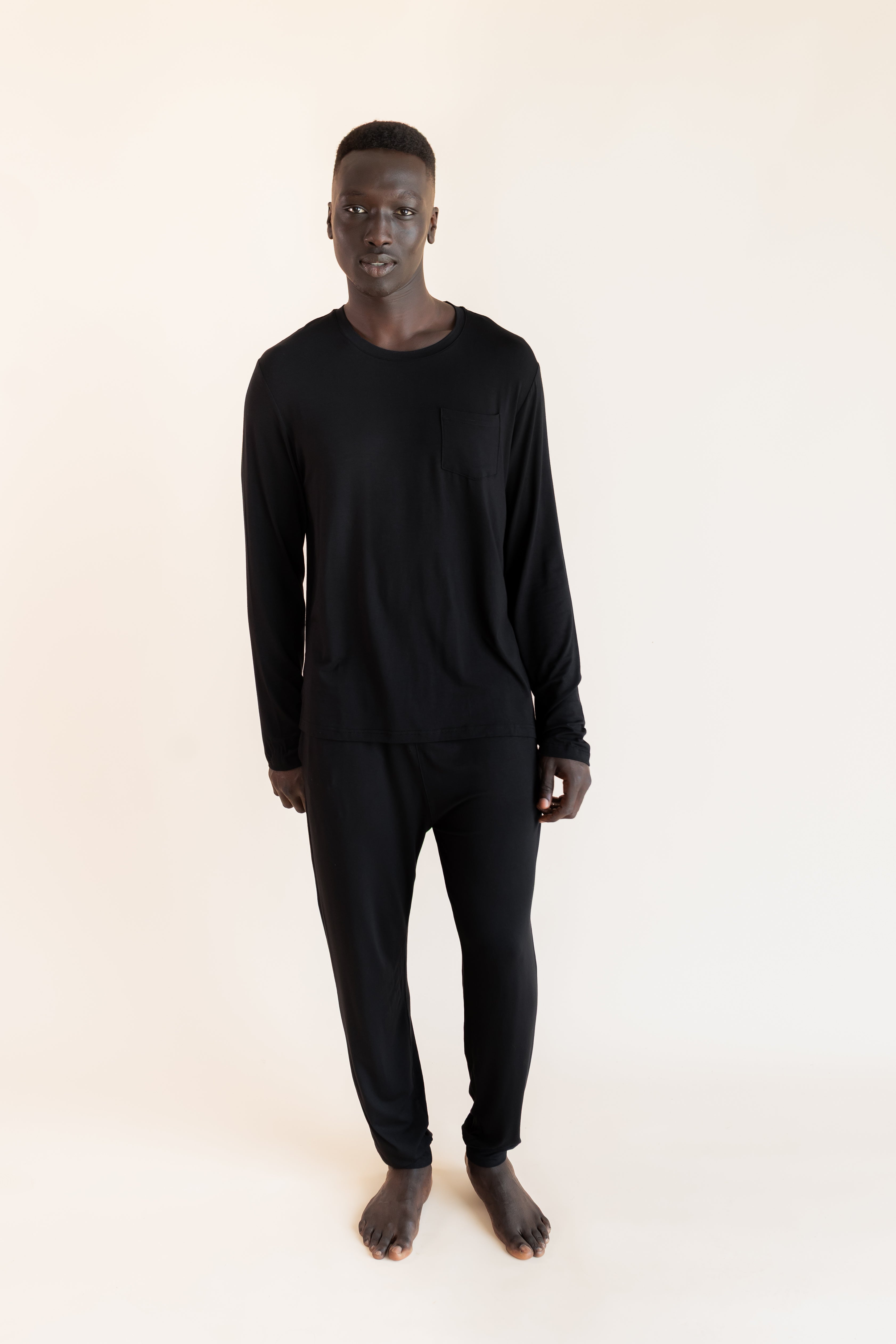 Male model wearing the Men's Jogger Set in Midnight