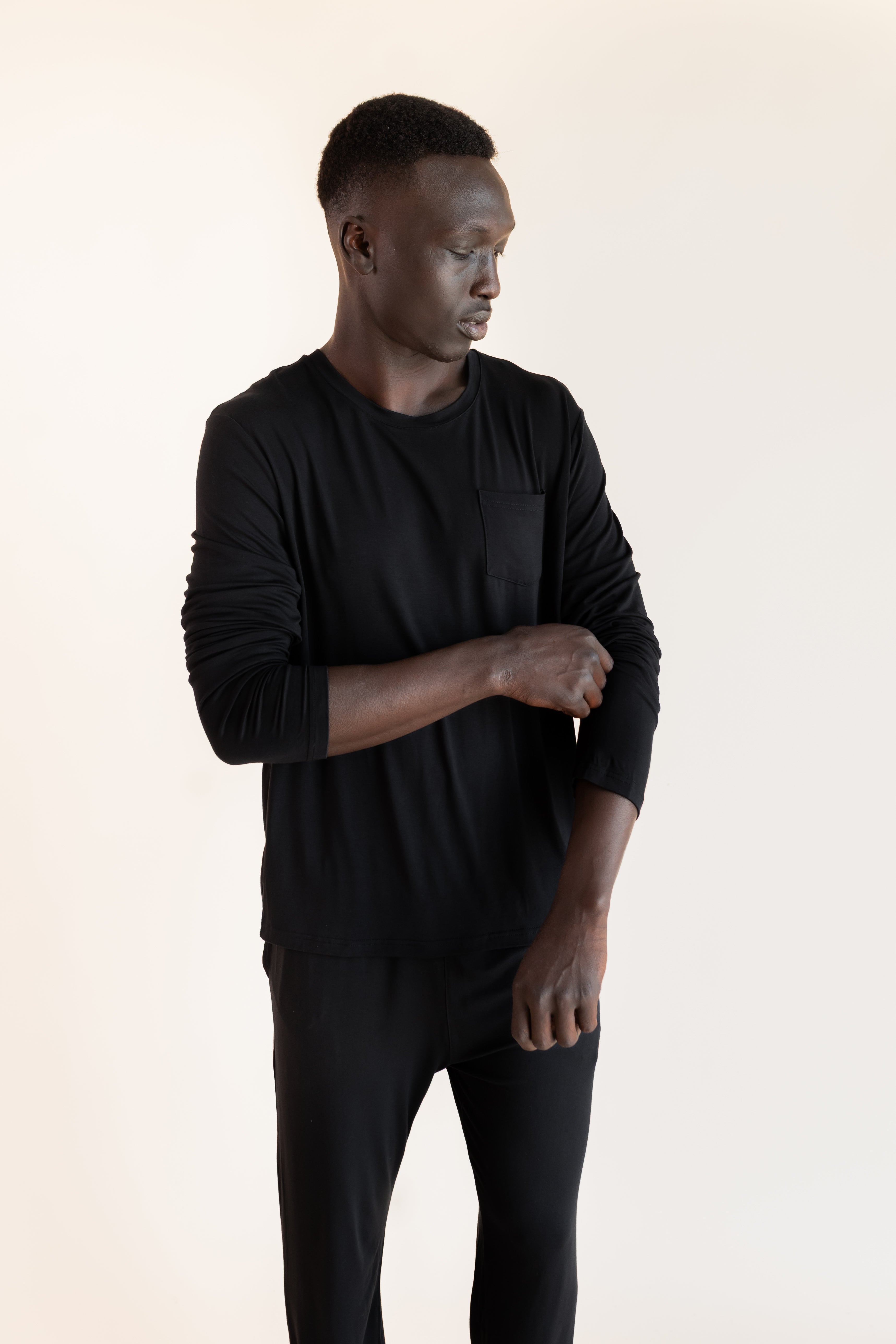 Male model wearing the Men's Jogger Set in Midnight