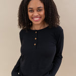 Model wearing the Women's Ribbed Henley Top in Midnight