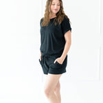 Model wearing the Women's Bamboo Jersey Rollup Sleeve Tee in Midnight and Midnight Bamboo Jersey Shorts