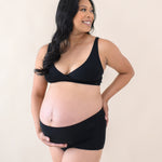 Woman modeling Women's High-Waisted Brief in Midnight with cross front bralette