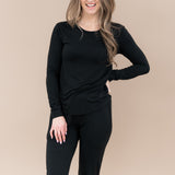 Smiling model wearing the Women's Jogger Pajama Set in Midnight