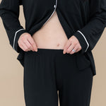 Close up of the elastic waistband on the Women's Long Sleeve Pajama Set in Midnight with Cloud Trim