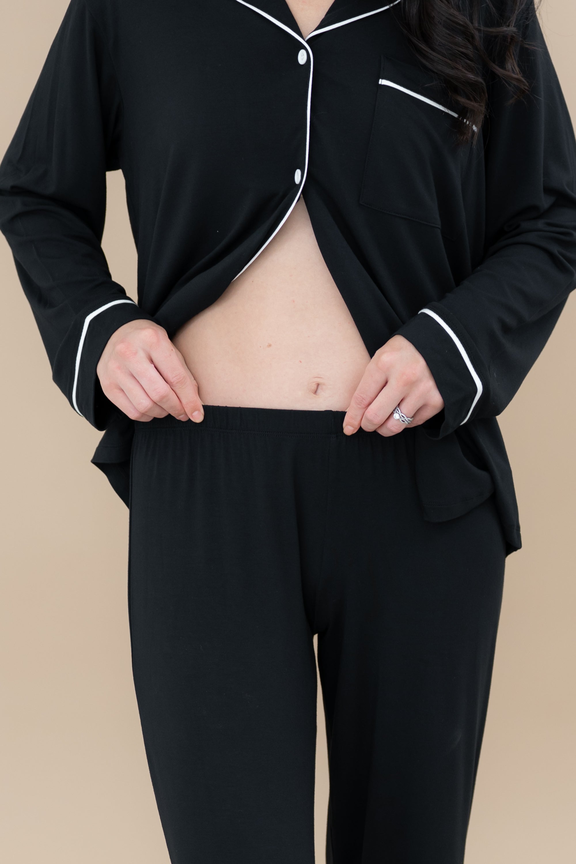Close up of the elastic waistband on the Women's Long Sleeve Pajama Set in Midnight with Cloud Trim