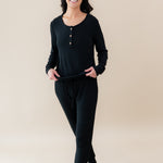 Woman walking smiling wearing Women's Ribbed Jogger Pant in Midnight