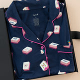 Long-Sleeved Women's Pajama Set in Navy Mahjong print packed in a box on a beige background