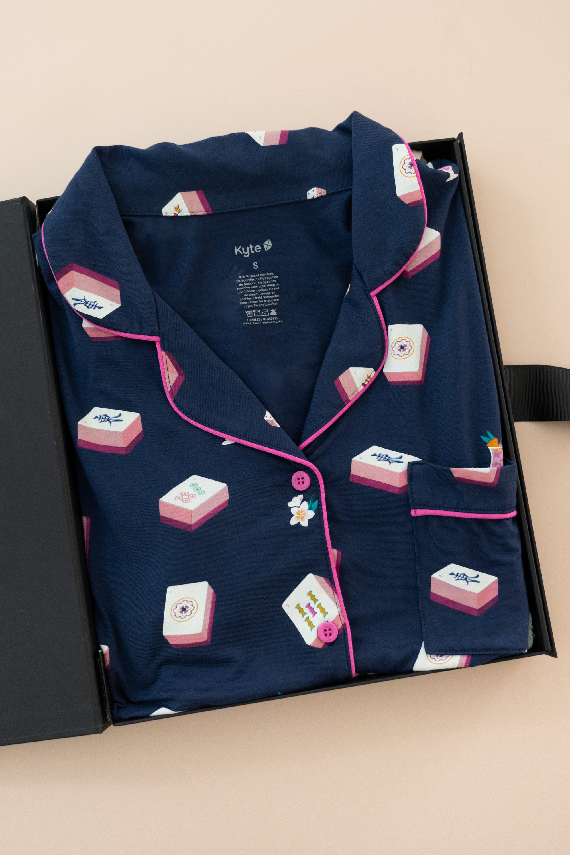 Long-Sleeved Women's Pajama Set in Navy Mahjong print packed in a box on a beige background