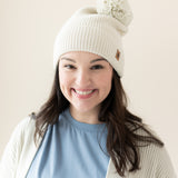 Woman modeling Chunky Knit Pom Beanie in Oat