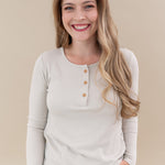 Model wearing the Women's Ribbed Henley Top in Oat