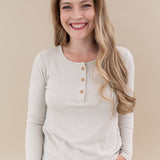 Model wearing the Women's Ribbed Henley Top in Oat