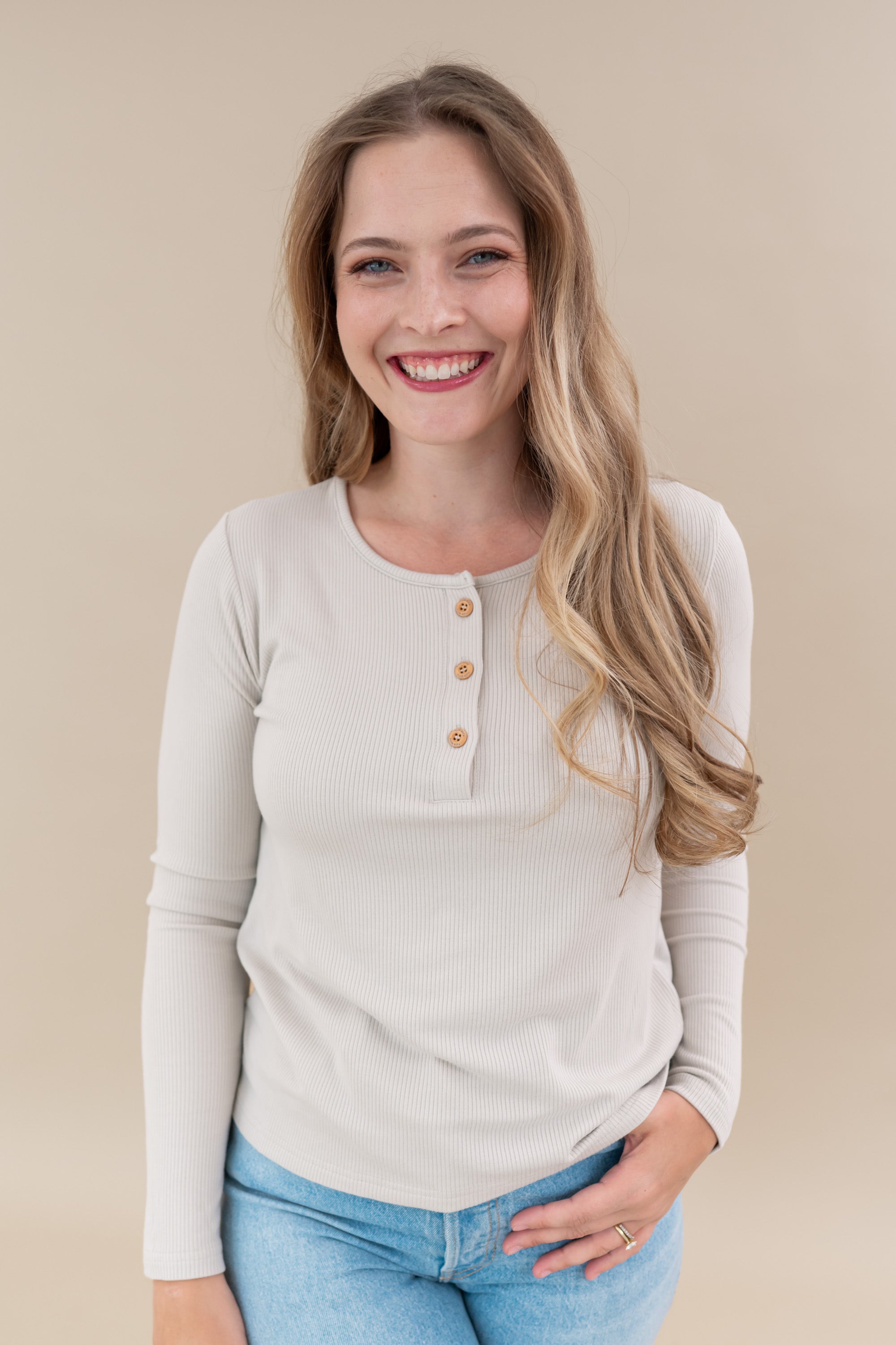 Model wearing the Women's Ribbed Henley Top in Oat