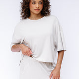 Model wearing the Women's Short Sleeve Tee in Oat