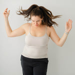Model in Kyte Baby's Women’s Camisole in Oat