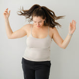 Model in Kyte Baby's Women’s Camisole in Oat
