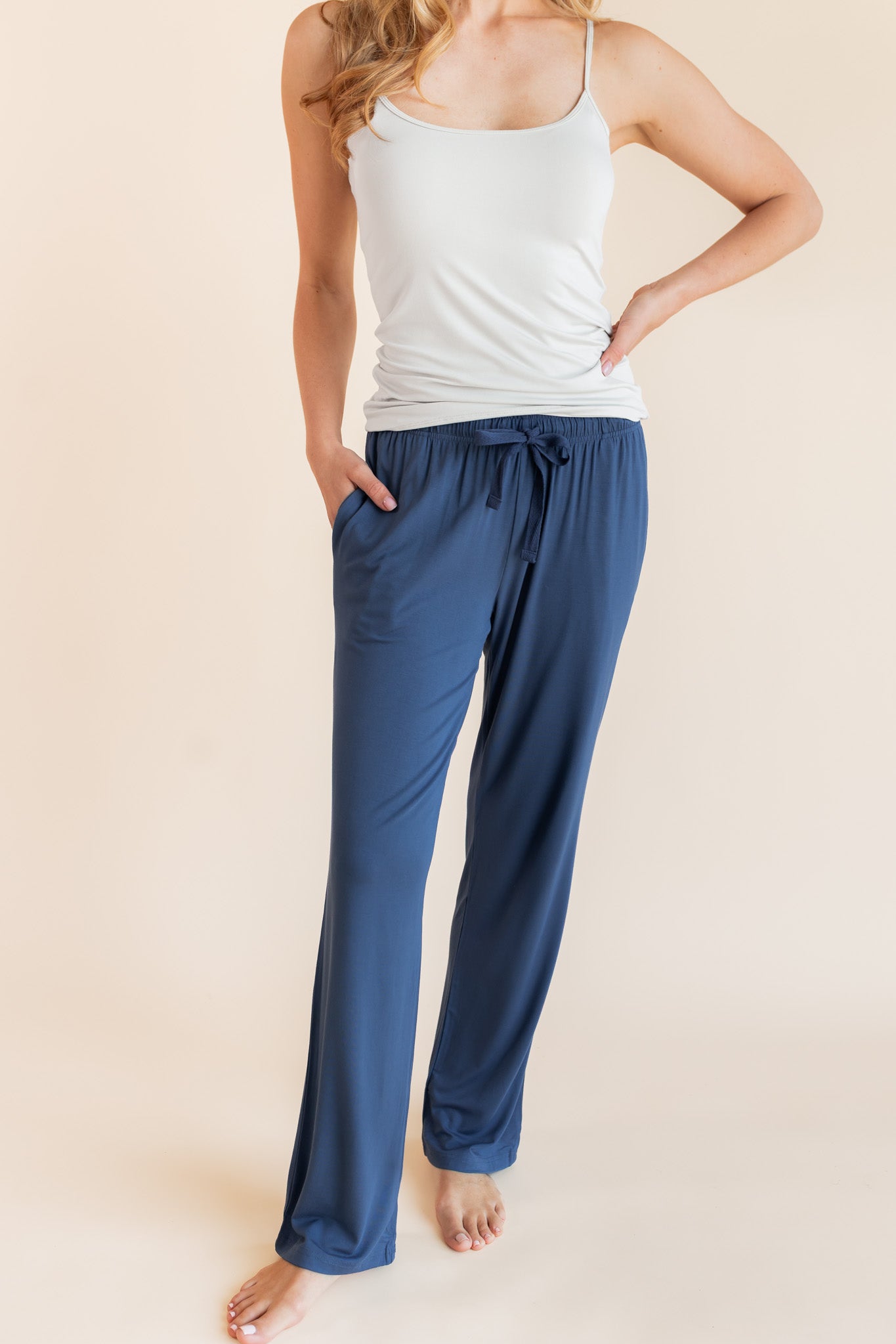 Model wearing Women's Lounge Pants in Oxford under white camisole on a beige background
::: Model is 5'9" wearing size XS ///
