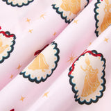 An all-over print featuring rows of scalloped medallions with a dark green border, gold dots, and a thin red bow at the top, over a pale pink background color called Sakura. One row of medallions alternates gold silhouettes of Cinderella holding her glass slipper, and Snow White with a bird on her finger. Another row of medallions alternates gold silhouettes of Belle holding her skirt and a rose, and Tiana holding her skirt.
---1605 1
