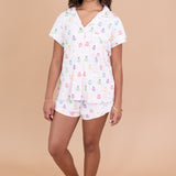 Women modeling the Kyte Short Sleeve Pajama Set in Pastel Ghost 