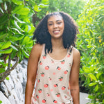 Closer up of a female model wearing the Women’s Tank Set in Peach