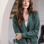 Woman with one arm holding the other in a cardigan in pine color
::: Model is 5'8" wearing size XS ///