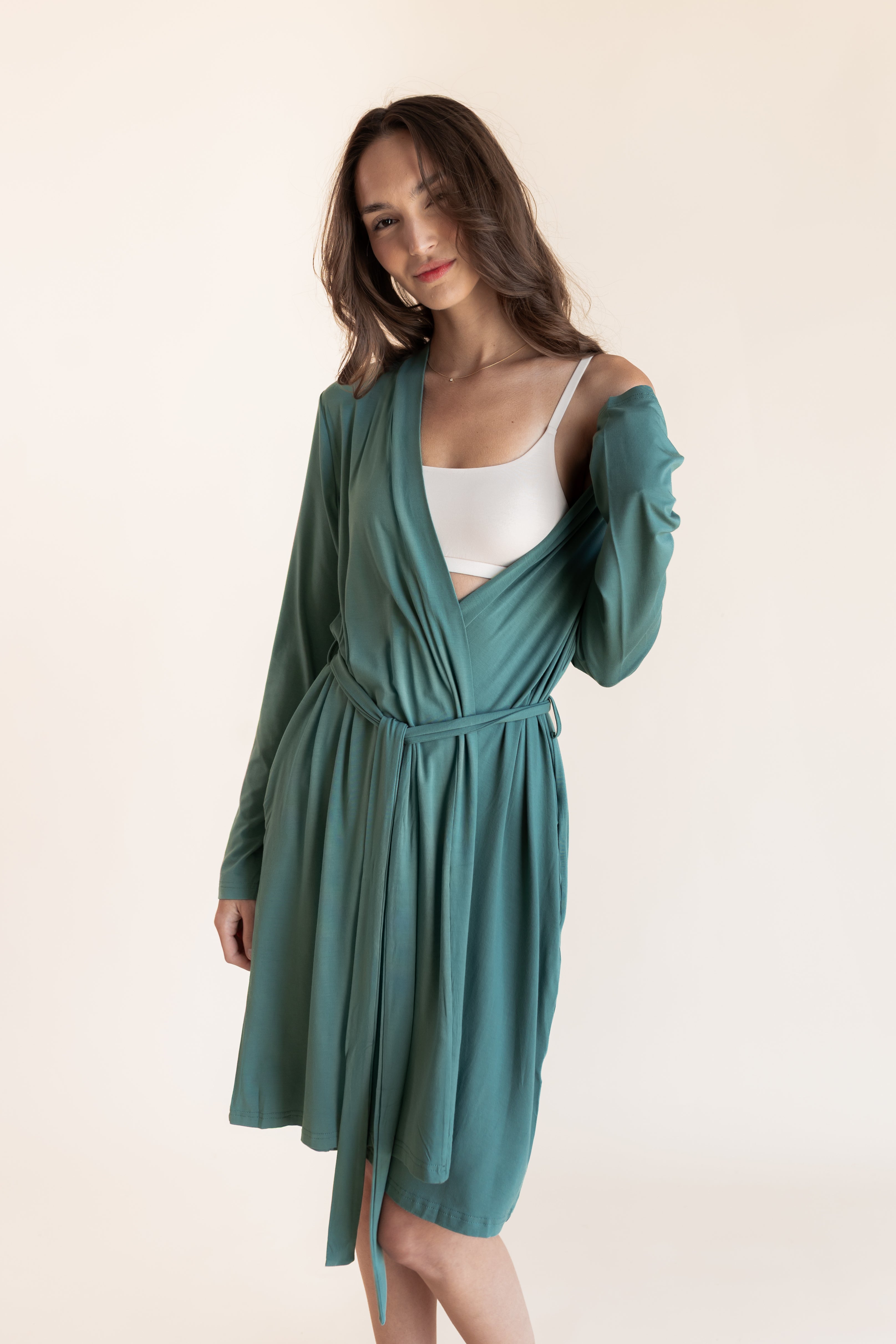 Model wearing Women's Lounge Robe in Pine over white bralette on a beige background
::: Model is 5'9.5" wearing size XS/S ///