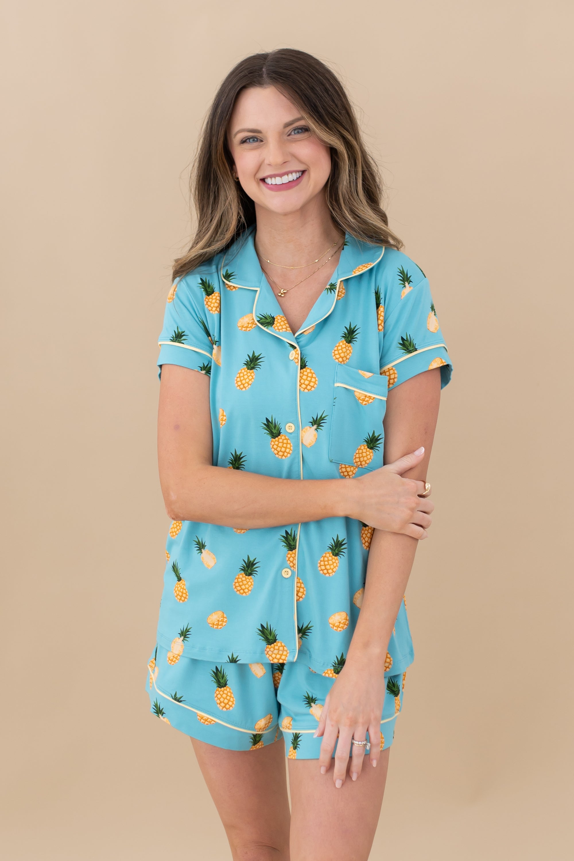 Woman modeling Women’s Short Sleeve Pajama Set in Pineapple smiling 