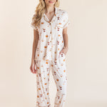 Model wearing Women's Short Sleeve Cropped Pajama Set in Pumpkin Spice Latte print on a beige background
::: Model is 5'9" wearing size XS ///
