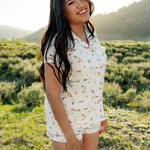 Woman modeling Women's Short Sleeve Pajama Set in Road Trip in Yellowstone National Park