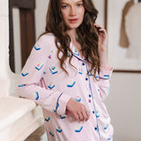 Modal posing in Long-Sleeved Women's Pajama Set in Sakura Mahjong print standing in a room

---1605 1