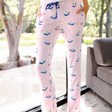 Close up of the Women's Lounge Pants in Sakura Mahjong on a model while she leans on a large window 

::: Model is 5'11" wearing size S ///