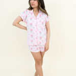 Woman modeling Women's Short Sleeve Pajama Set in Sakura Peony with hand on hip and feet crossed