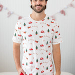 Model wearing the Men's Crew Neck Tee in Santa Sleigh paired with Lounge Pants in Cardinal