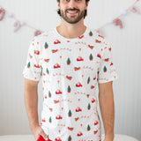 Model wearing the Men's Crew Neck Tee in Santa Sleigh paired with Lounge Pants in Cardinal