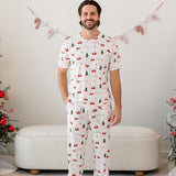 Male model wearing the Men's Crew Neck Tee in Santa Sleigh paired with matching lounge pants