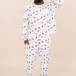 Male model with hand in pocket and one hand on head while wearing the Men's Jogger Set in Santa Sleigh