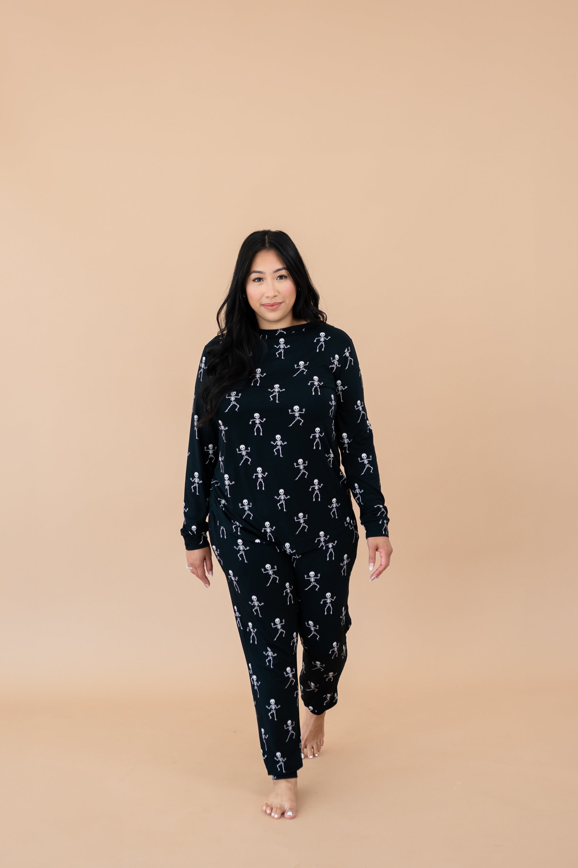 Model walking towards camera in Adult Jogger Set in Skeleton 