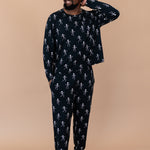 Model with arm on head while wearing the Kyte Men's Jogger Set in Skeleton 
