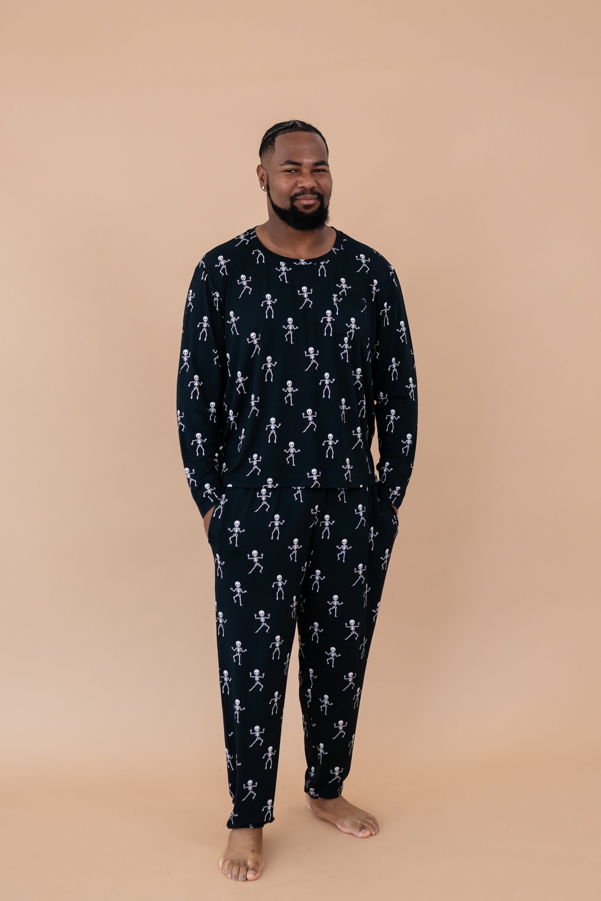 Standing model wearing the Kyte Men's Jogger Set in Skeleton 