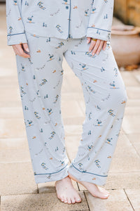 The pants of the Long-Sleeved Women's Pajama Set in Ski shown on a model