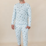 Male modeling the Men's Jogger Set in Ski standing in front of a light beige background with one hand in the jogger pants pocket