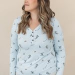 Female modeling the Women's Long Sleeve Henley Tee in Ski